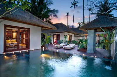 a villa with a swimming pool in a resort at Jimbaran Puri, A Belmond Hotel, Bali in Jimbaran
