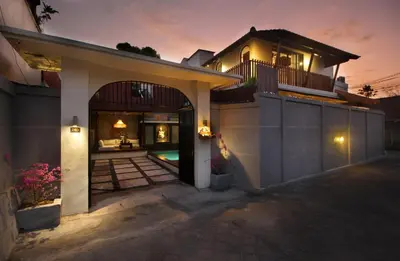 a house with an entryway with a patio at Sudha Villa Bali Anyelir in Seminyak