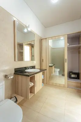 a bathroom with a sink and a mirror at Villa Sedana, Seminyak - 2 Bedroom Private Pool Villa! in Seminyak