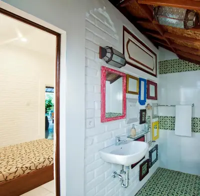 a bathroom with a sink and a bed at 3BR Villa Hari - Special Stay Bonus - Minggu Villas Seminyak in Seminyak