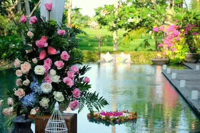 a bouquet of flowers sitting on top of a pond at Villa Sally in Canggu