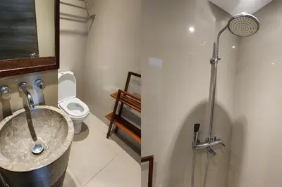 a bathroom with a sink and a toilet at The Crystal Luxury Bay Resort Nusa Dua in Nusa Dua