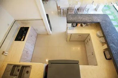 an overhead view of a kitchen and a toilet in a room at Villa Niluh in Canggu