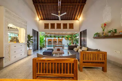 a living room with a couch and a table at Villa Sarong 2 Chic 2BR Boho Villa Prime Central Location in Seminyak