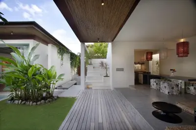 a kitchen and living room of a house at Kiss Bali Villas in Seminyak