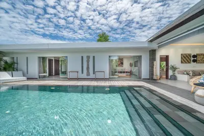 a house with a swimming pool with a sky ceiling at Villa Bima - 3 Bedroom Villa in Seminyak in Seminyak