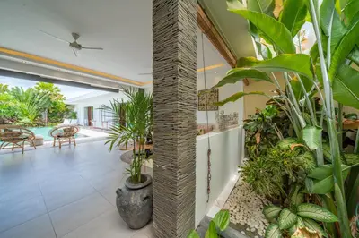 an indoor garden with plants in a house at Villa Bima - 3 Bedroom Villa in Seminyak in Seminyak