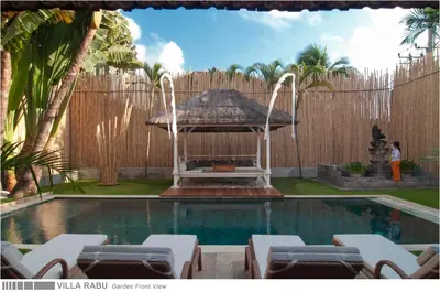 a swimming pool with a gazebo in a backyard at 3BR Villa Rabu - Minggu Villas Seminyak in Seminyak
