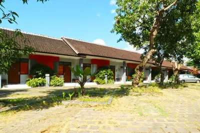 a building with a car parked in front of it at Sayang Residence 2 in Denpasar