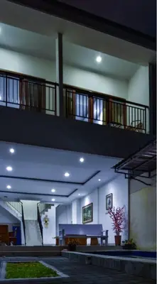 an empty building with stairs and a stair case at Degung de brata Family villas in Legian