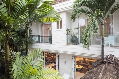 an aerial view of a house with palm trees at Villa Bebek in Seminyak