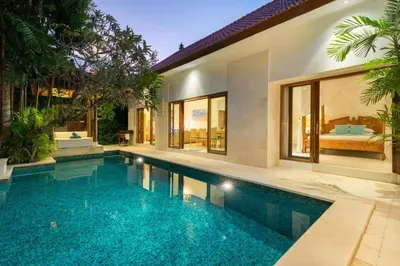 a swimming pool in a house with a bedroom at Super Value 3 Bed, Central Seminyak, Walk to Beach in Seminyak