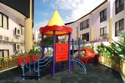 a playground with a hat on top of it at Kuta Central Park Hotel in Kuta