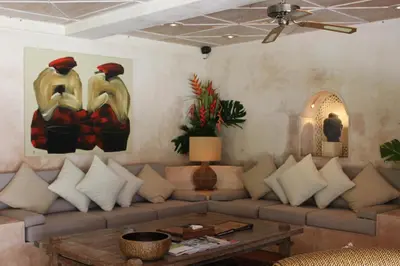 a living room with a couch and a table at Sienna Villas Seminyak in Seminyak