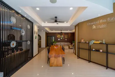 a store with a table in the middle of a room at Everyday Hotel Kuta Central in Kuta