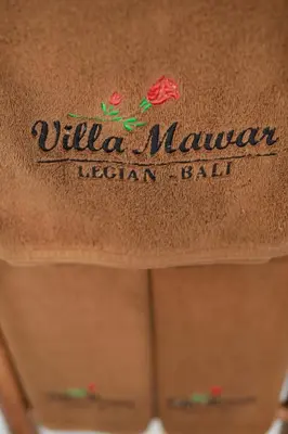 a close up of the back of a brown leather bag at Villa Mawar Legian in Legian