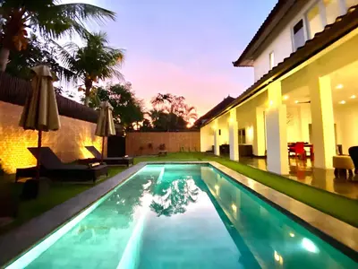 a swimming pool in the backyard of a house at Villa JULIA | heart of Seminyak | 350m Beach in Seminyak