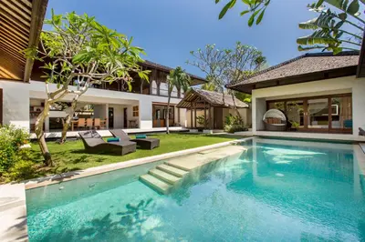 a swimming pool in the backyard of a house at Villa Air Bali Boutique Resort and Spa in Seminyak