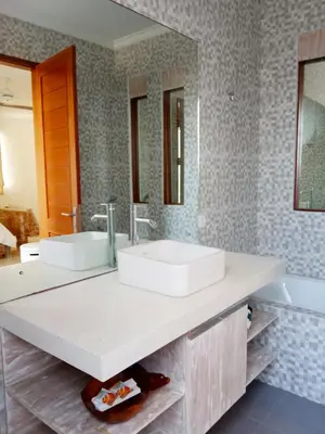 a bathroom with two sinks and a large mirror at ★ VIP ★ Green Studio Apartment in Seminyak, No.23 in Seminyak