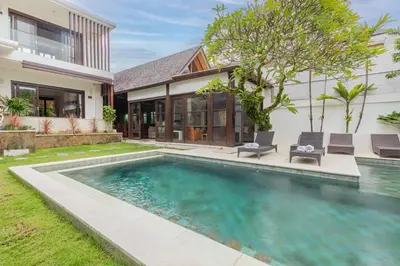 an image of a swimming pool in the backyard of a house at Villa Harmony - Residence in Seminyak