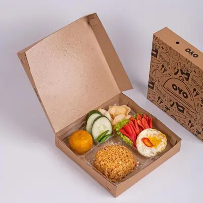 a box filled with different types of food at Collection O Sanur Near Bali Exotic Marine Park in Sanur