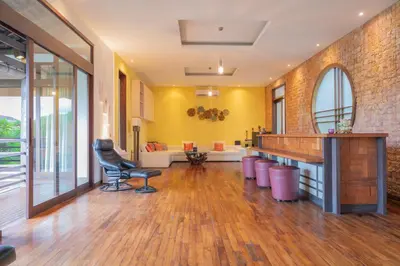 a living room with a desk and a chair at Villa Nara - Your Unique & Private Villa in Seminyak Petitenget in Seminyak
