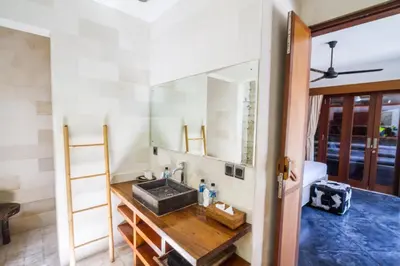 a bathroom with a sink and a mirror at Villa Martine - Fantastic 5BR Villa - Perfect Location in Seminyak in Seminyak
