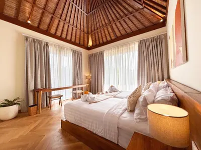 a bedroom with a large bed and a large window at NEW 2BR Minica Villa in the heart of Kayu Aya, Oberoi, Seminyak walking distance to Beach, Shops, Restaurants in Seminyak