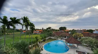an image of a swimming pool in a house at Nipuri Resort and Villas Seminyak by Kamara in Seminyak