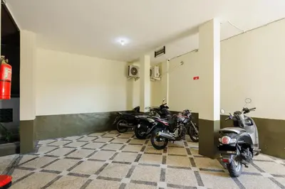 a group of motorcycles parked in a garage at Urbanview Hotel Rasa Sayang Inn Tanjung Benoa Bali in Nusa Dua