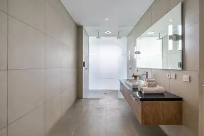 a bathroom with a sink and a mirror at Villa Jekumah 3 in Seminyak