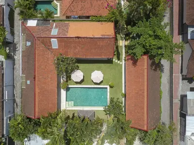 an aerial view of a house with a swimming pool at Rumi Villas in Seminyak