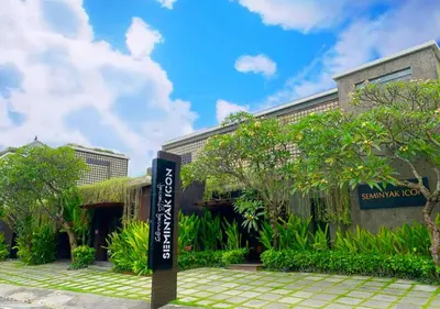 a building with a sign in front of it at Seminyak Icon - by Karaniya Experience - CHSE certified in Seminyak
