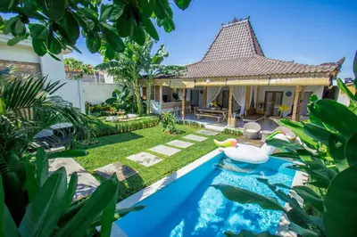 an image of a backyard with a pool and a house at Villa Orked 1 in Seminyak