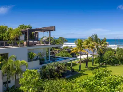 an aerial view of a resort with the ocean in the background at Noku Beach House by Elite Havens in Seminyak