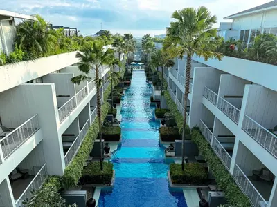 an aerial view of a waterway between two buildings at Kanvaz Village Resort Seminyak in Seminyak