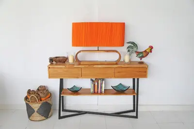 a table with a lamp on top of it at Villa Orked 2 in Seminyak