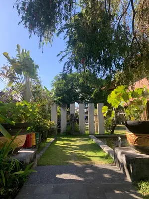 a grave yard with a row of white crosses at The Awan Villas Seminyak in Seminyak