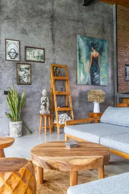 a living room with a couch and a table at Villa Maje by Alfred in Bali in Seminyak