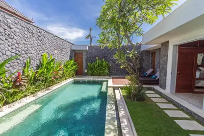 a swimming pool in the backyard of a house at Vishuddha Ajna Villa - Outstanding 2 bdr villa - GREAT LOCATION! in Seminyak