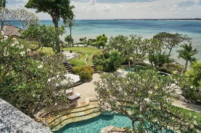an aerial view of a resort with the ocean at Four Seasons Resort Bali at Jimbaran Bay in Jimbaran