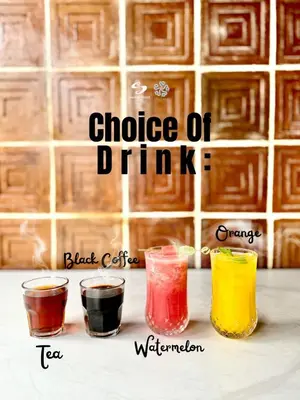 a group of four different colored drinks on a counter at Sandat Hotel Legian in Legian