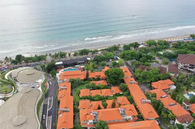 an aerial view of a city and the beach at Grand Istana Rama Hotel in Kuta
