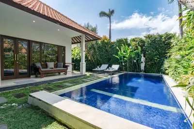 a swimming pool in the backyard of a villa at MAHAYANA VILLA - 7Min Beach Access - 10min to Canggu in Canggu