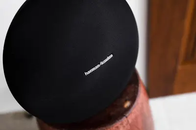 a black hat sitting on top of a wooden post at Villa Pandi in Seminyak
