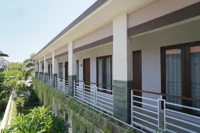 a view of the balcony of a building at Capital O 2166 Elitya Stay in Sanur