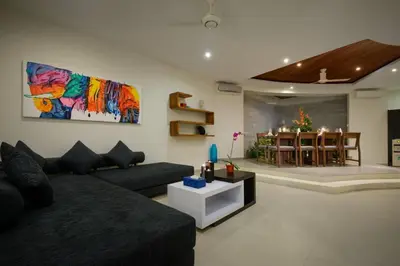a living room with a couch and a table at Villa Miro - Luxury, 3 Bed, Central Seminyak in Seminyak