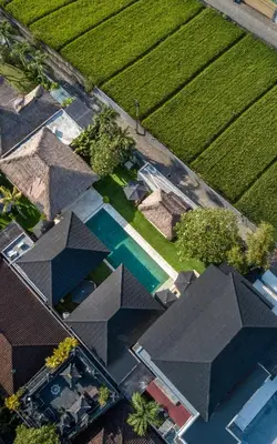 an overhead view of a house with roofs and a pool at Huge 11 BR Villa, Sleeps 41, Prime Area, Near Beach in Canggu