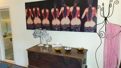 a table in a room with a display of shoes at Luxury Villa La plancha BEACH 200m, Heart of Seminyak in Seminyak