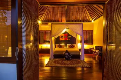 a bedroom with a bed in a room at Imani Villas in Canggu